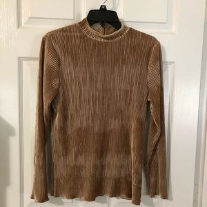b. young velvet/corduroy feel top.